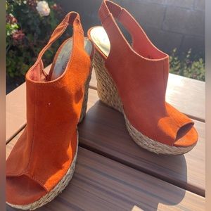 Carlos Santana Wedges